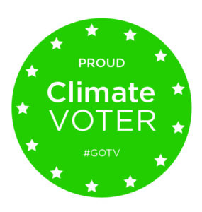 Image of circular green logo that reads "Proud Climate Voter #GOTV"